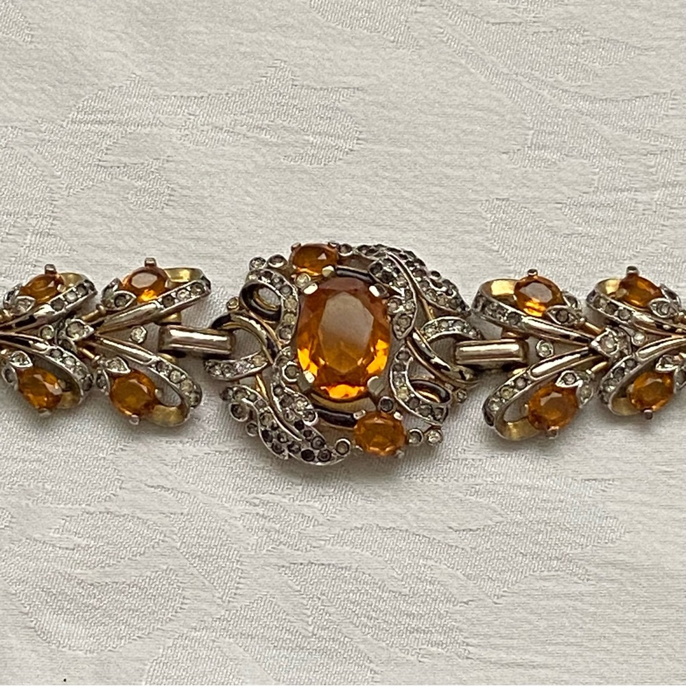 Vintage costume bracelet with amber colored stones.